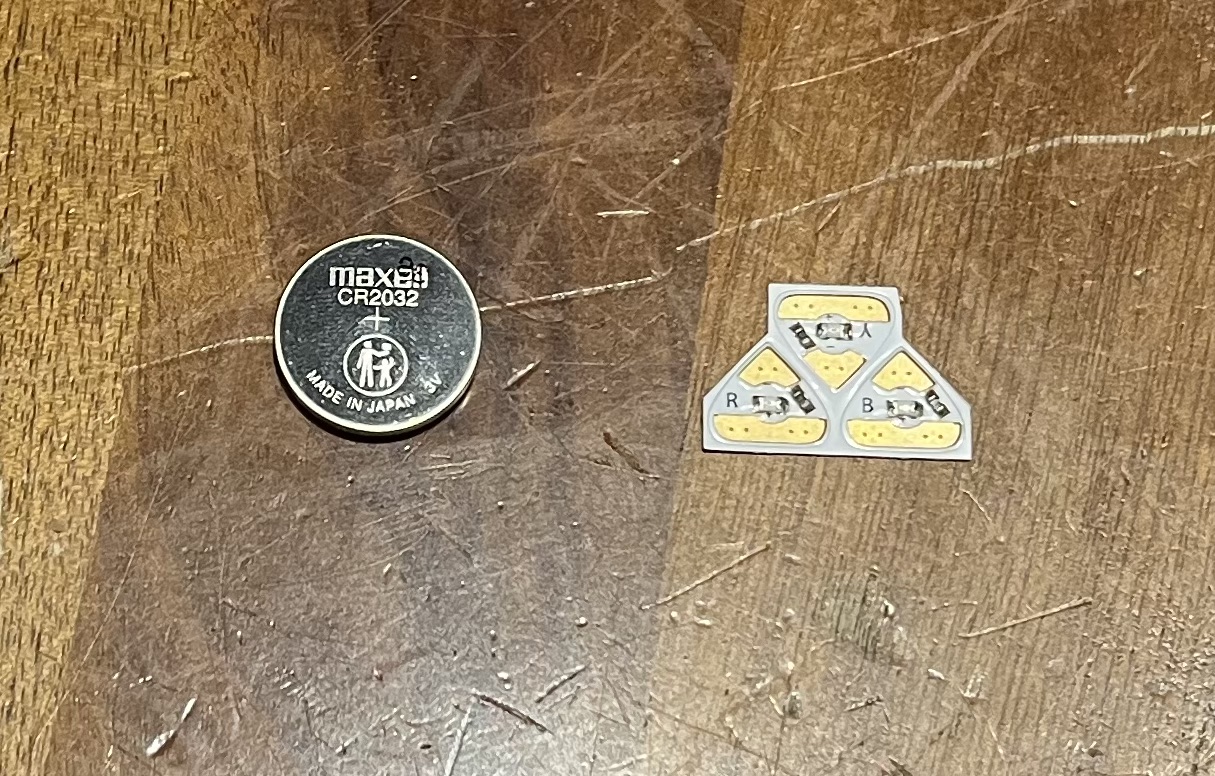 Here I was observing the led lights and battery -- I didn't know the led lights was an adhesive and and a group of 3 lights in one little pack 