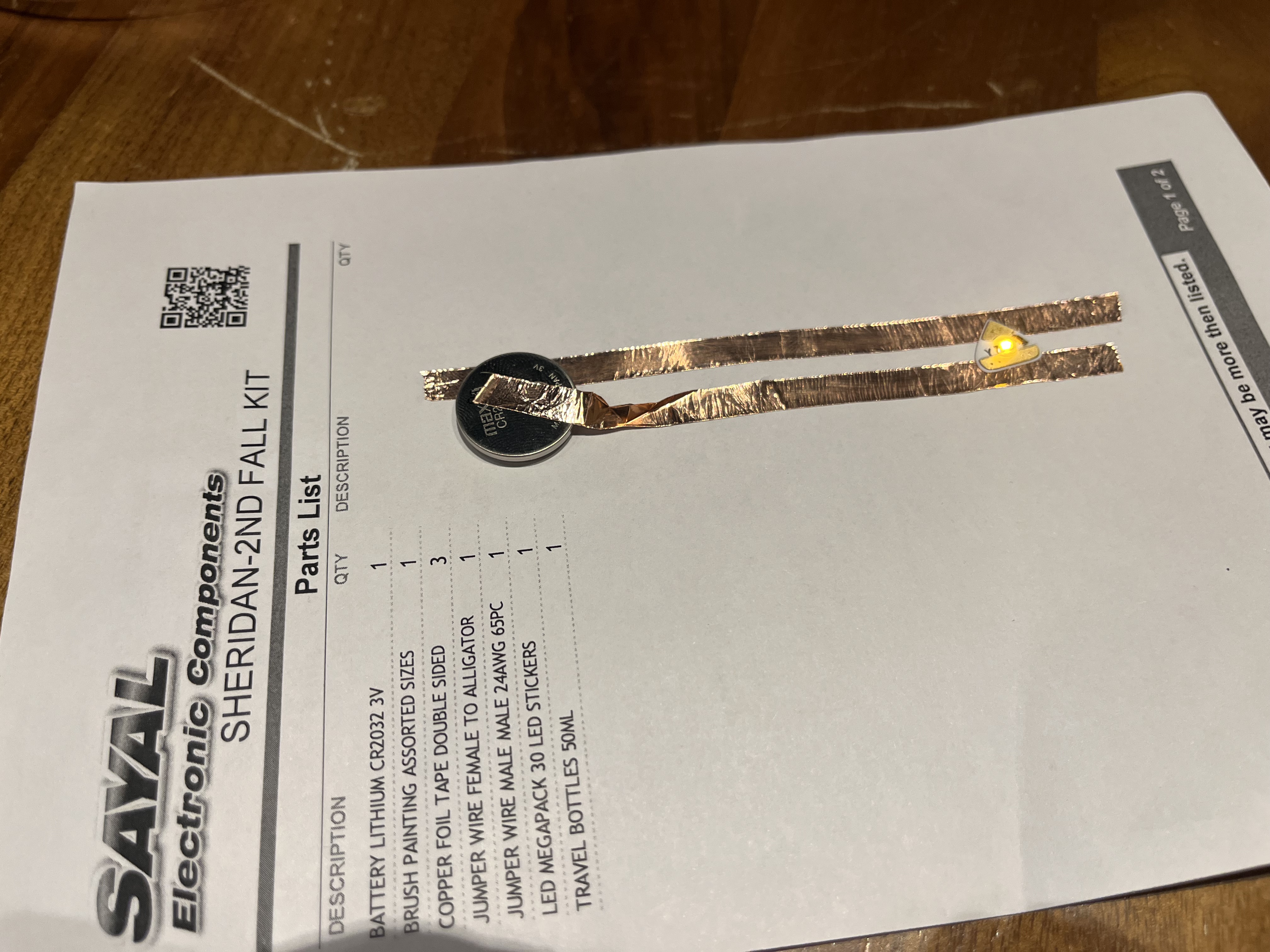 I didn't use tape but I felt like me pressing on the battery for a while made the battery not lift